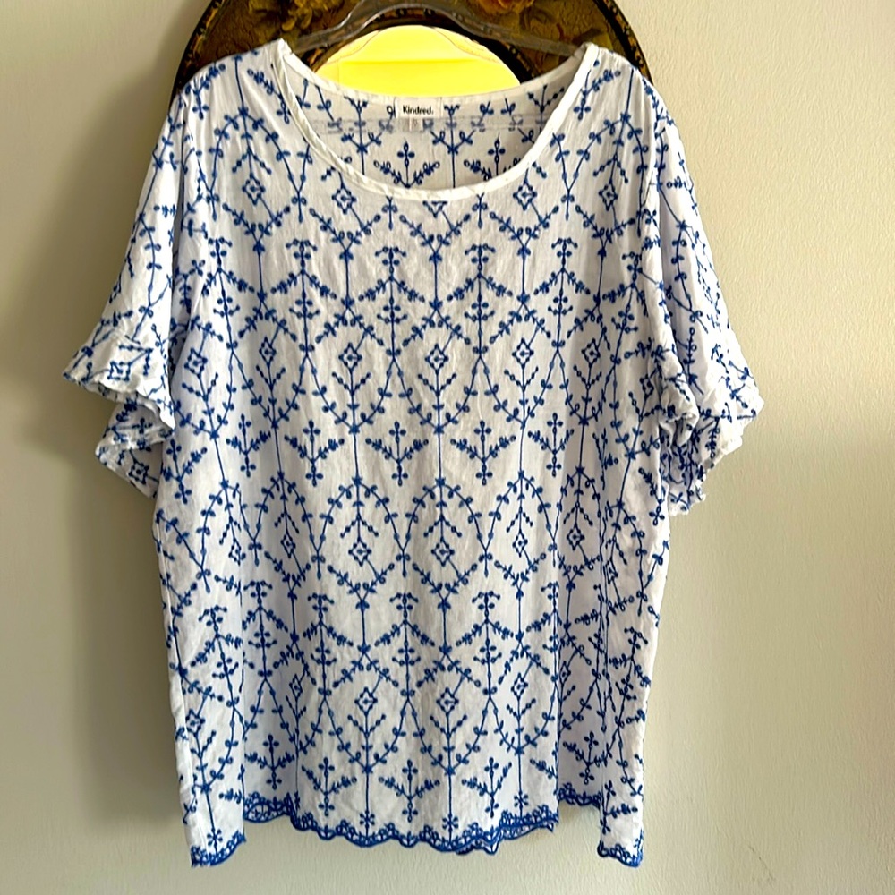 Lightweight women’s embroidered cotton shirt; Gently worn. Flounce sleeve.